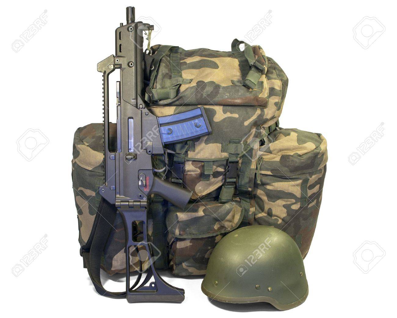 15359557-soldier-equipment-automatic-rifle-backpack-helmet-Stock-Photo.jpg